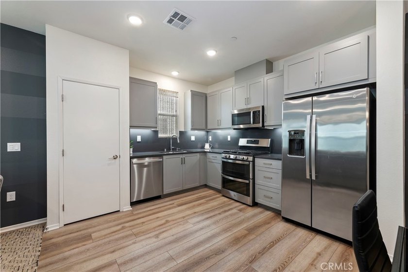 Step into a home that offers more than just a place to live. It - photo 9