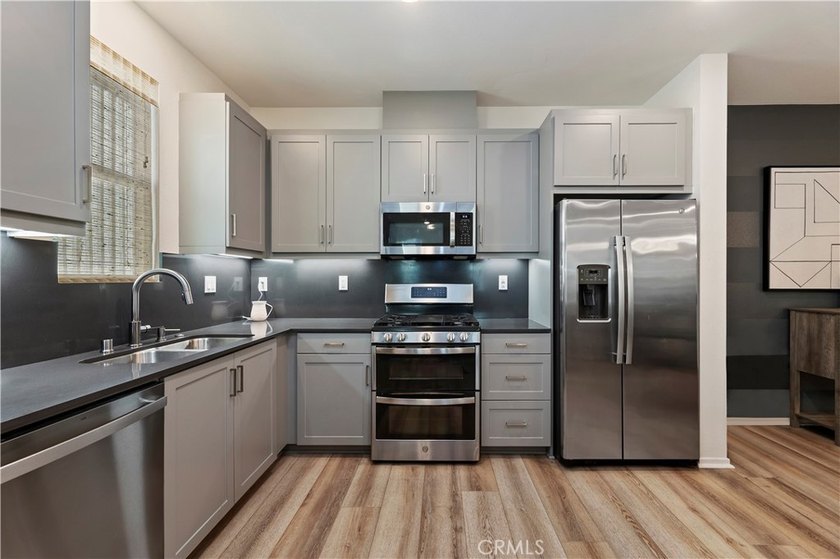 Step into a home that offers more than just a place to live. It - photo 10