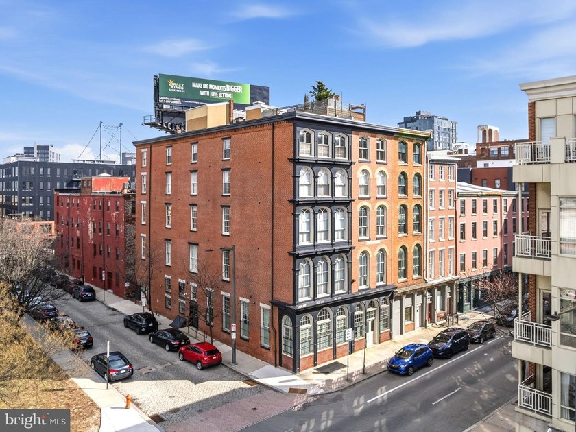 This beautifully updated penthouse offers a unique blend of - photo 2