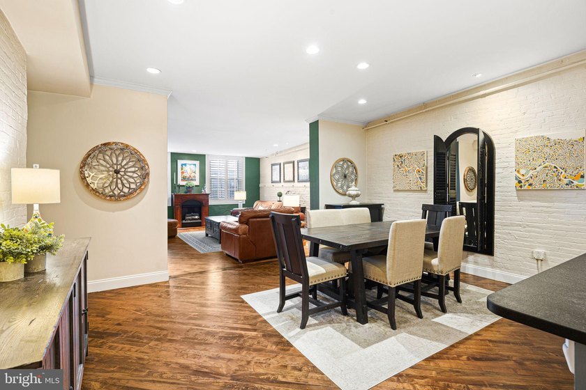 This beautifully updated penthouse offers a unique blend of - photo 7