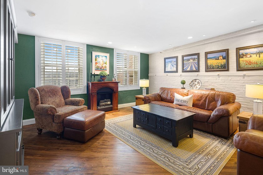 This beautifully updated penthouse offers a unique blend of - photo 10
