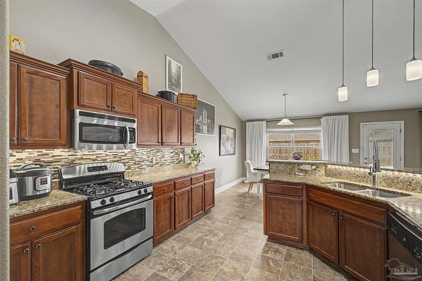 Tucked away in a secluded neighborhood, this expansive one-story - photo 22