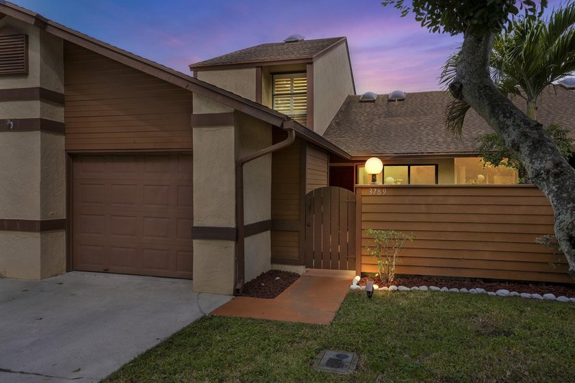Welcome to this beautifully remodeled townhome, where style - photo 2