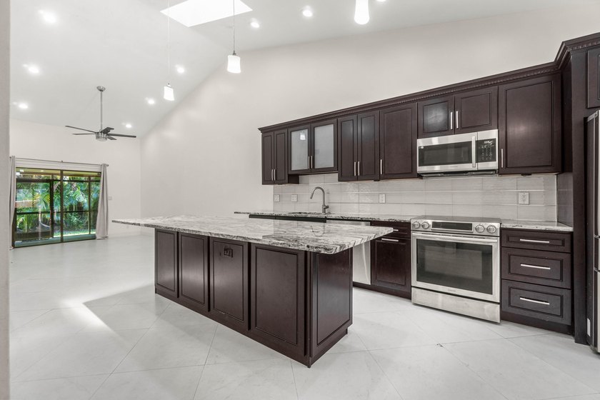 Welcome to this beautifully remodeled townhome, where style - photo 4