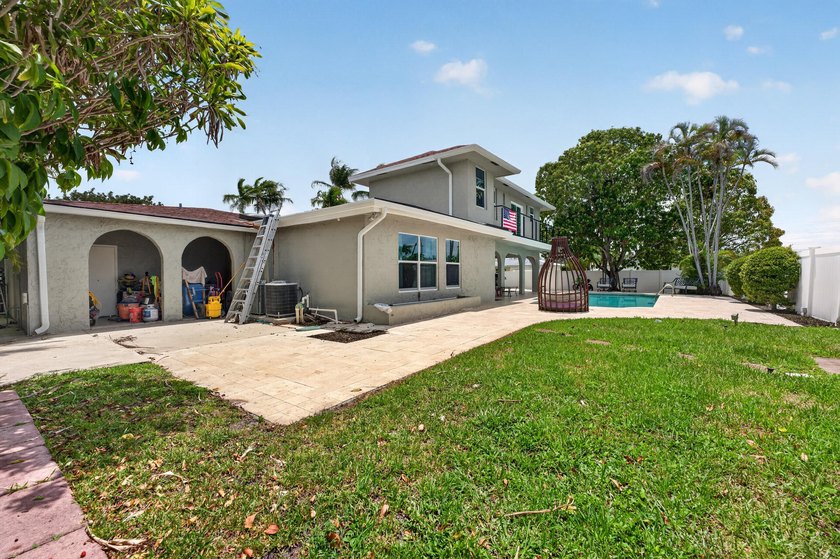 Stunning &amp; fully expanded two-story pool home in the heart of - photo 5