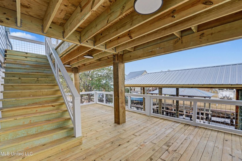 This beautiful Coastal Home offers a timeless blend of Charm and - photo 2