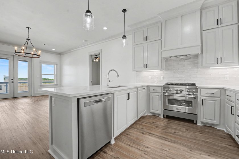 This beautiful Coastal Home offers a timeless blend of Charm and - photo 10