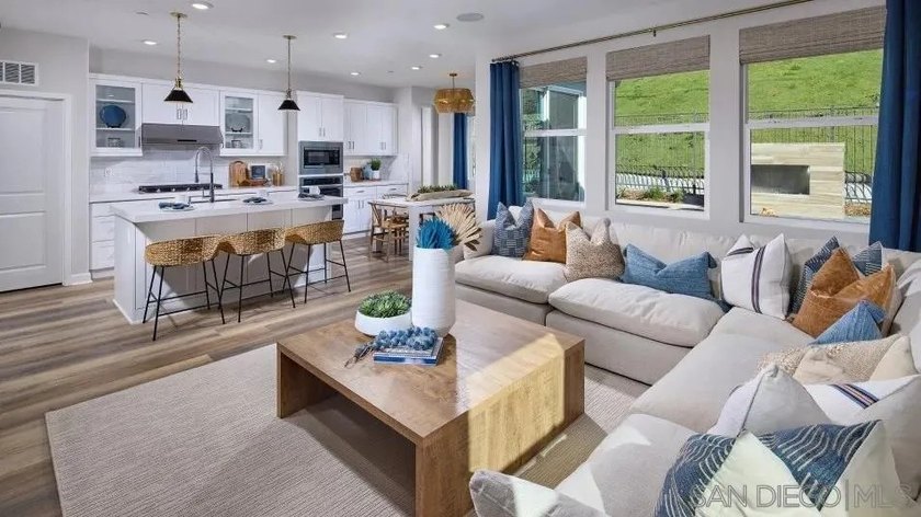 This spacious two-story paired home for residents ages 55 and - photo 8