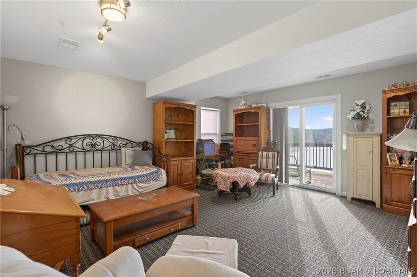 This 3-bedroom, 2.5-bath lakefront home offers over 2,000 square - photo 33