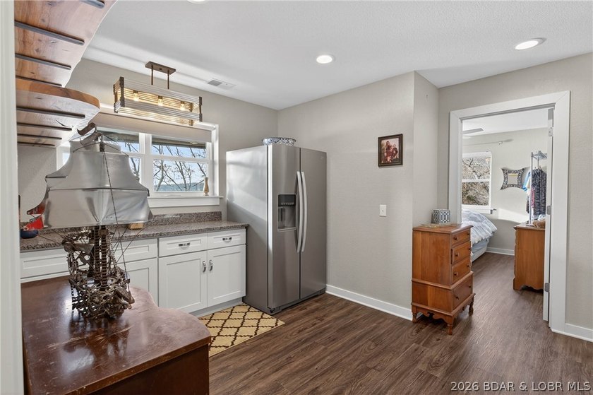 This 3-bedroom, 2.5-bath lakefront home offers over 2,000 square - photo 35
