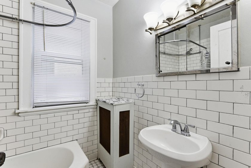 This 3-bedroom, 2-bath home with a detached 2-car garage is full - photo 12