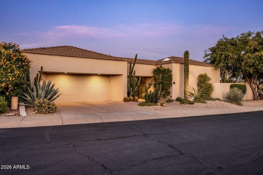 Refined desert living beckons beyond a striking glass gated - photo 3