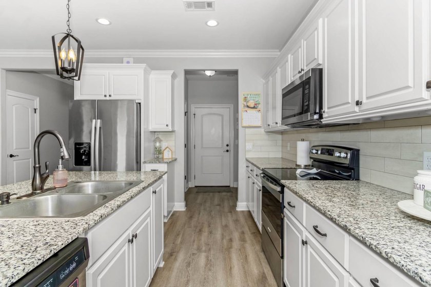 Take a look at this like-new, 3-bedroom, 2-bath home with an - photo 5