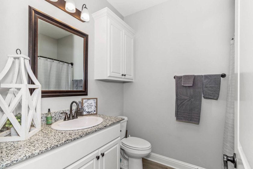 Take a look at this like-new, 3-bedroom, 2-bath home with an - photo 8