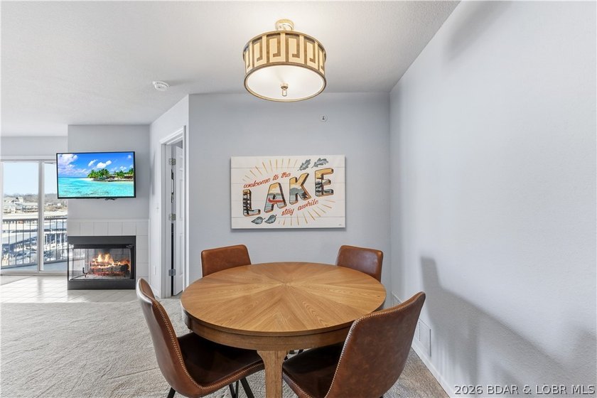 Experience Lake of the Ozarks living at its finest in this - photo 13