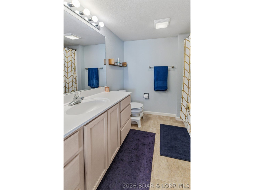 Experience Lake of the Ozarks living at its finest in this - photo 20
