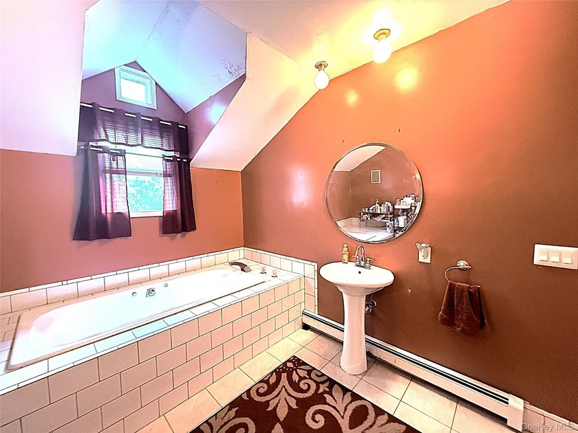 Experience timeless elegance in this impressive 5 bedroom, 2.5 - photo 13