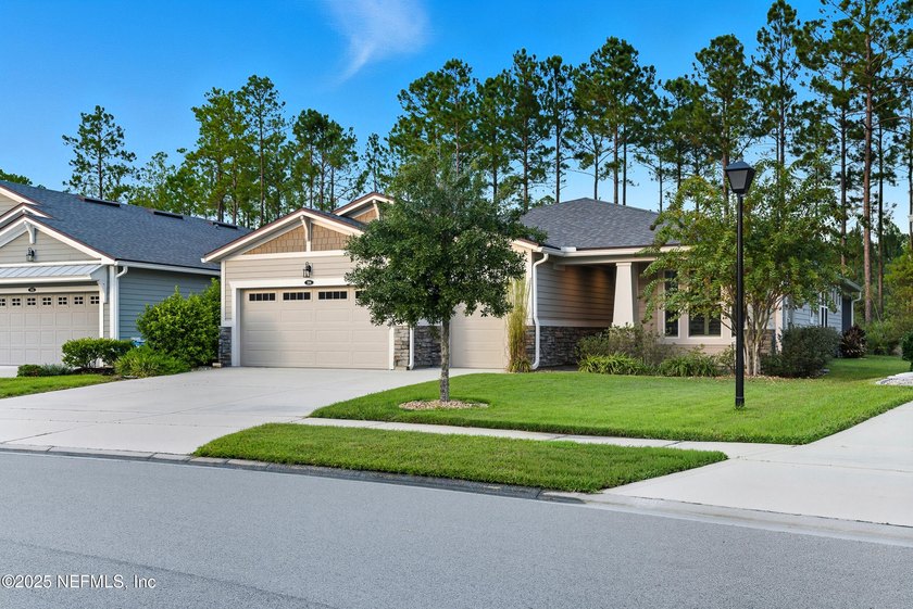 Welcome to this beautifully upgraded home in WaterSong at - photo 4