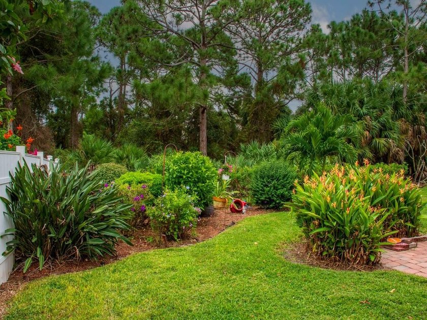 Indoor-outdoor living takes center stage in this well-maintained - photo 6
