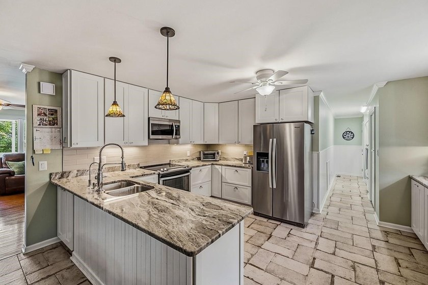 Discover the Lake Greenwood lifestyle in this beautifully - photo 8