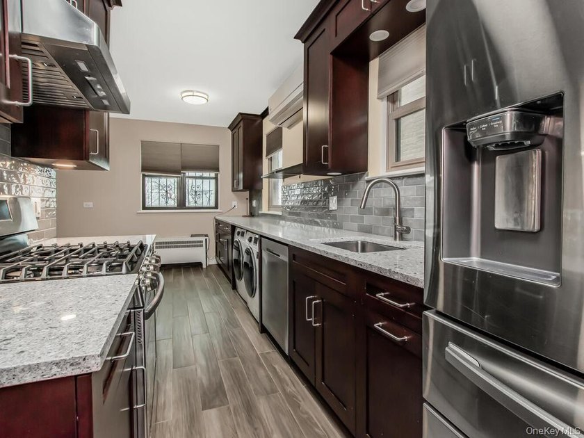 Stunning Brick Two-Family Home with Breathtaking Reservoir Views - photo 2