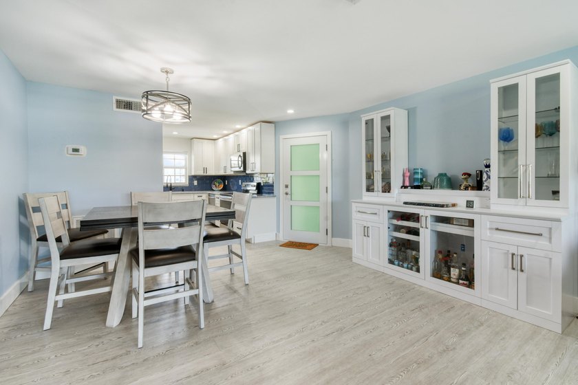 Experience waterfront living in this beautifully updated - photo 11
