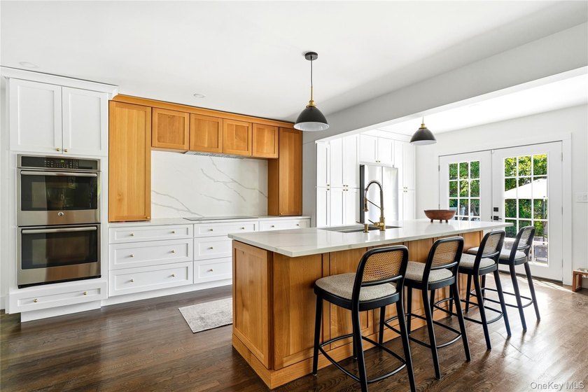 Welcome to this tastefully updated 4-bedroom, 3-bath home in one - photo 13