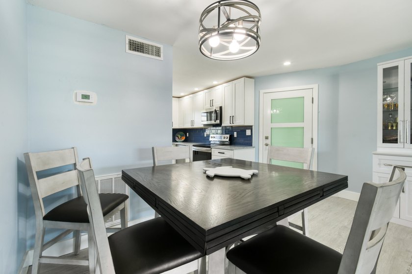 Experience waterfront living in this beautifully updated - photo 13