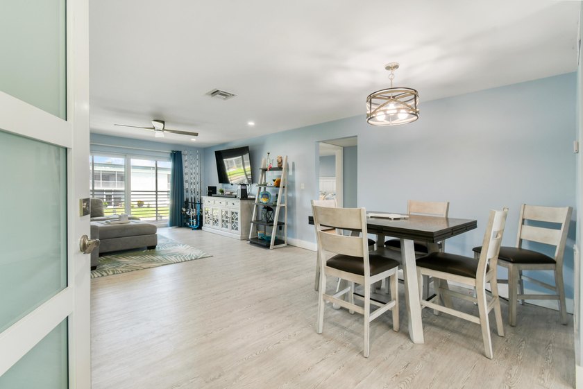 Experience waterfront living in this beautifully updated - photo 14