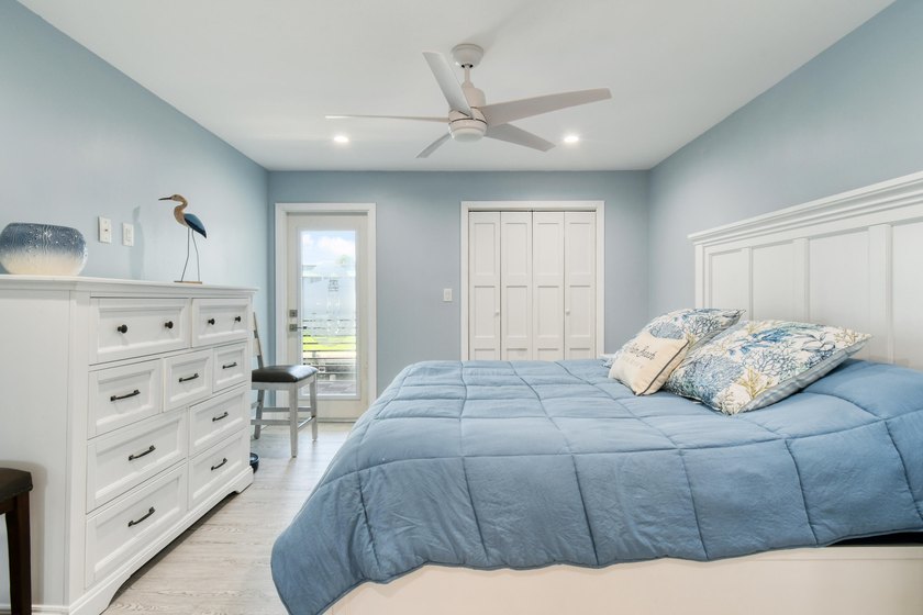 Experience waterfront living in this beautifully updated - photo 19