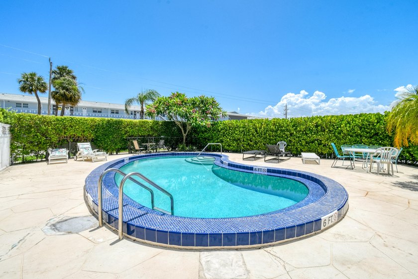 Experience waterfront living in this beautifully updated - photo 31