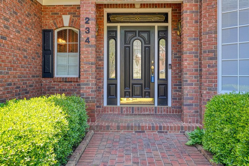 Welcome to 234 N Lake Emory Drive, a stately lakefront residence - photo 3
