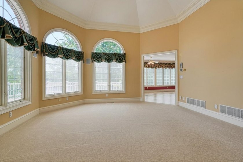 Welcome to 234 N Lake Emory Drive, a stately lakefront residence - photo 7