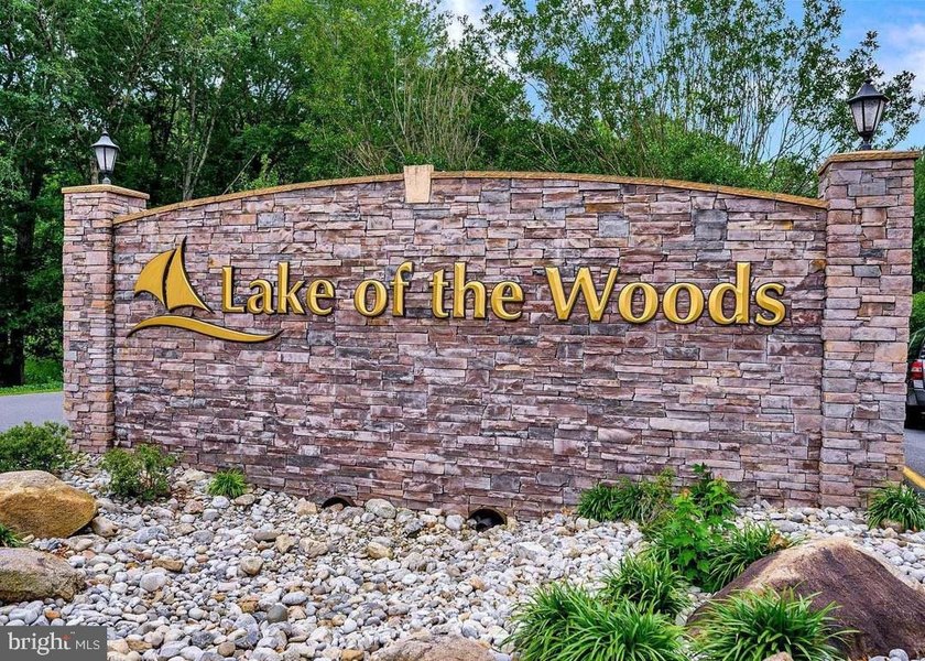 Nestled in the prestigious Lake of the Woods community, this - photo 13