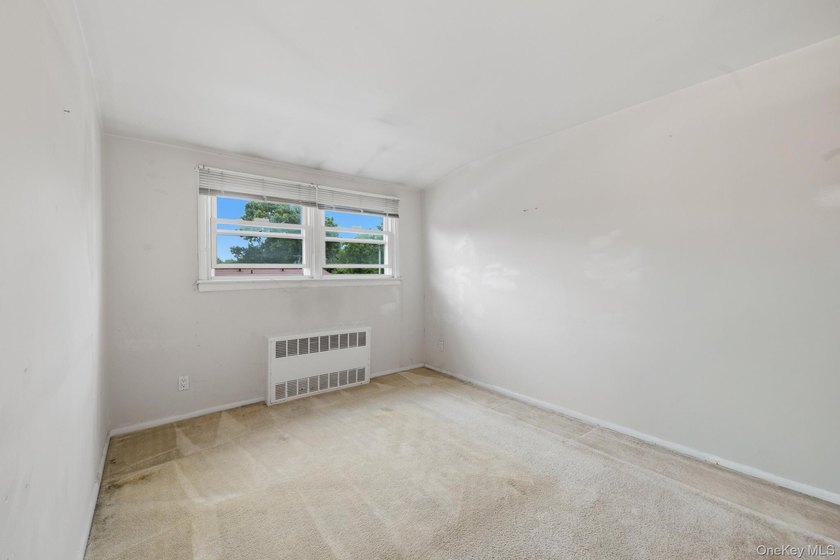 Spacious and seldom-available 3-bedroom, 1.5 bath duplex co-op - photo 14
