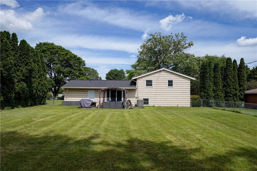 Welcome to 243 Eden Lane in the town of Greece, where this - photo 37