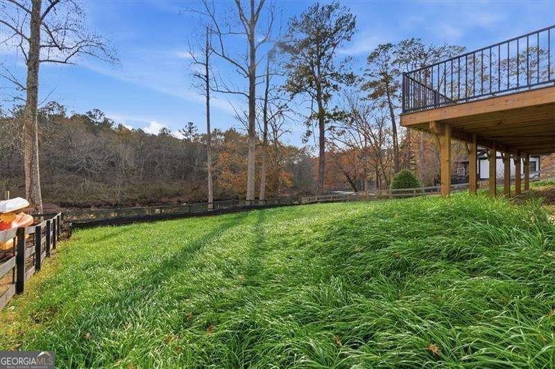 Nestled directly on the banks of the Etowah River, this - photo 44