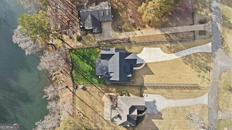 Nestled directly on the banks of the Etowah River, this - photo 49