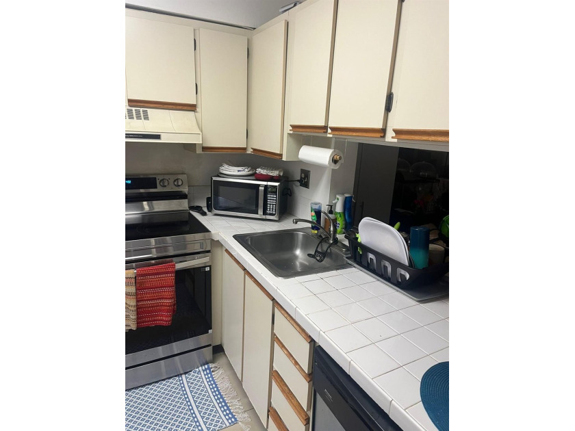 Welcome home! This charming 2-bedroom, 2-bath residence offers - photo 3