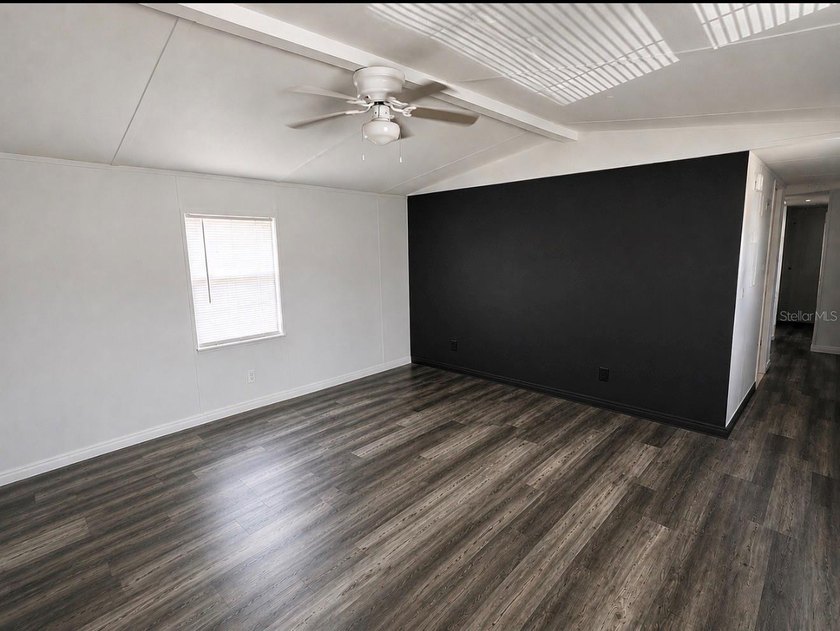 Welcome to this beautifully renovated 3-bedroom, 2 bath single - photo 3