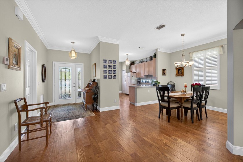 Situated on a large corner lot with lush tropical landscaping - photo 7