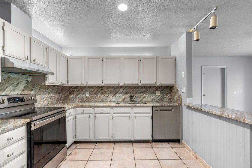 Here's your chance to own one of the largest homes on one of the - photo 11