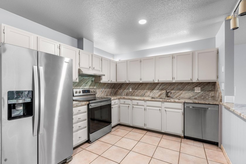 Here's your chance to own one of the largest homes on one of the - photo 13