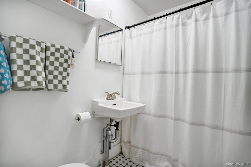 Multi-Family: Located down a tree lined street in the hamlet of - photo 14