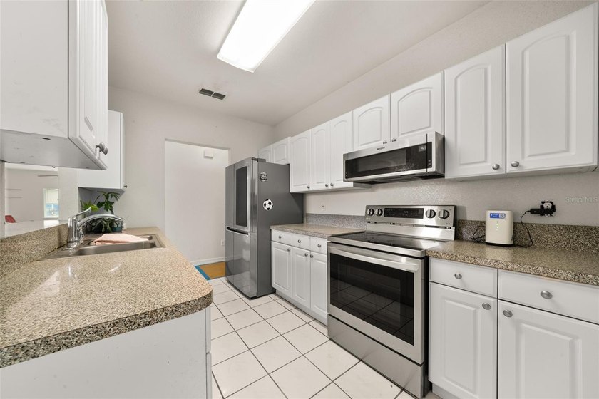 Enjoy the perfect blend of space, comfort, and privacy in this - photo 8