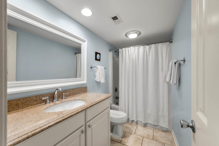 Perched on the top floor of desirable Pelican Watch Villas, 1360 - photo 18