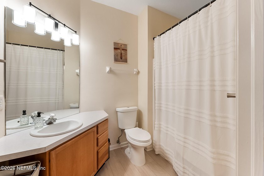 Embrace effortless, low-maintenance living in this immaculate - photo 11