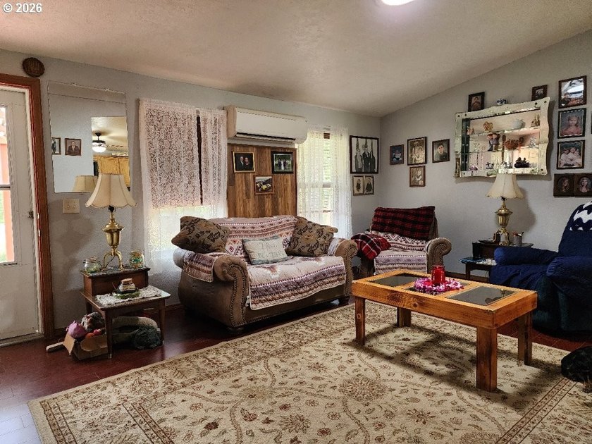 Tucked away among the trees on 1.16 private acres with a Large - photo 11