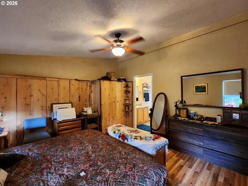 Tucked away among the trees on 1.16 private acres with a Large - photo 12