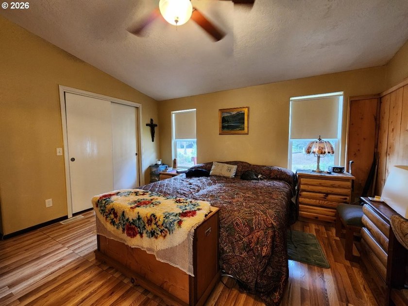 Tucked away among the trees on 1.16 private acres with a Large - photo 13